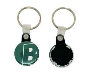 Two 25mm Button Keyrings, each featuring a circular green token labelled "B" on one side and a solid black surface with a white edge on the other, attached to metal key rings.