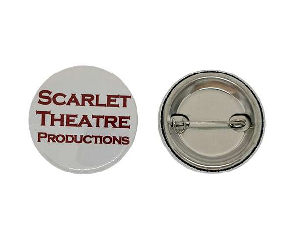 Two 32mm Button Badges with round pin-back design; the front features "Scarlet Theatre Productions" in red text, whilst the back displays a metal pin mechanism.