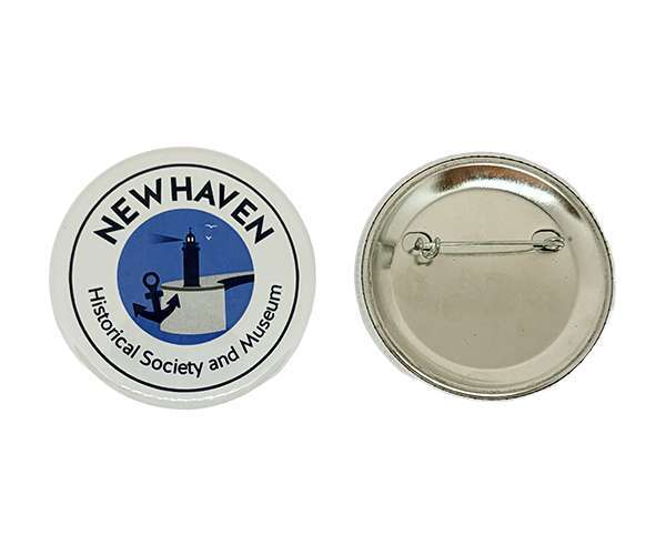 Two 58mm Button Badges; front side features "New Haven Historical Society and Museum" with a lighthouse graphic, whilst the back side has a metal pin fastening.