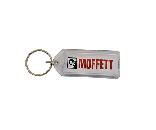An Acrylic Keyring (50mm x 20mm lozenge) featuring a metal ring and the word “MOFFETT” printed in red alongside a black and white logo.