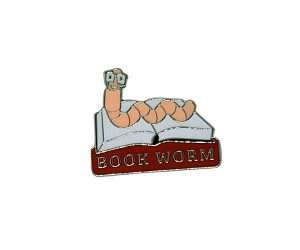 A cartoon worm with glasses pops out of an open book above the words “BOOK WORM” on the red Bookworm Badges plaque.