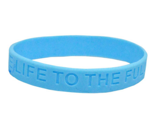 A blue silicone wristband with raised text that reads "LIVE LIFE TO THE FUL.
