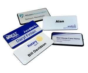 Five Domed Name Badges are displayed, each showcasing different names, job titles, logos, and company names on white backgrounds.