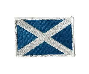 The Scotland Flag Embroidered Badge is a rectangular patch featuring the Scottish flag's distinctive white saltire on a blue background.