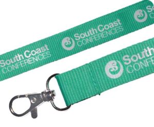A green Ribbed Polyester Lanyard with a metal clasp, featuring "South Coast CONFERENCES" and a circular white logo.