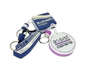 Three EVA Foam Floating Keyrings in blue, white, and purple colours, featuring round or rectangular shapes and attached to metal key rings.