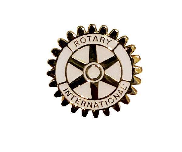 A Rotary Wheel Lapel Badge in a gold and white gear-shaped design featuring the organisation’s name around the centre.