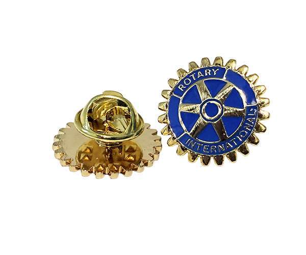 Two Rotary Wheel Lapel Badges in gold and blue, featuring a gear design with “Rotary International” around the centre. One badge displays the front, whilst the other shows the back clasp.