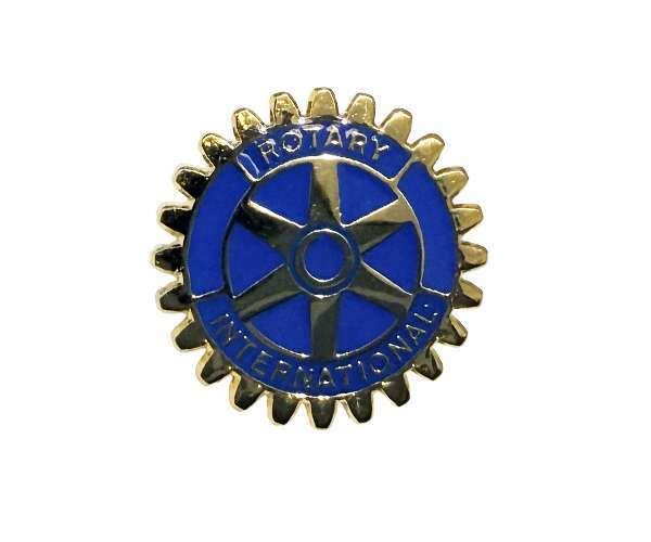 A Rotary Wheel Lapel Badge featuring a gold and blue gear-shaped design with “Rotary International” text encircling the outer edge and a six-spoked wheel at the centre.