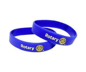 Two Rotary wristbands in blue silicone featuring the word “Rotary” and the Rotary International logo printed in white and yellow.