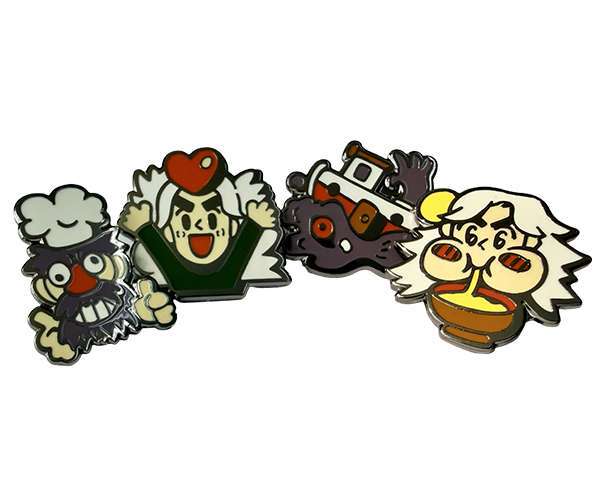 Set of four Traditional Hard Enamel Badges, featuring colourful cartoon designs: a chef, a person with a heart above their head, a creature with a boat, and a person eating noodles.