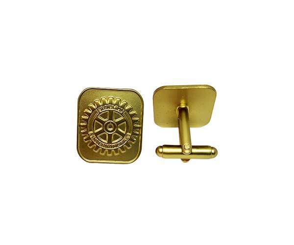 A pair of Rotary Gold Cufflinks is shown on a white background, with one cufflink featuring a gear emblem with text and the other displaying the back view with a swivel fastening.