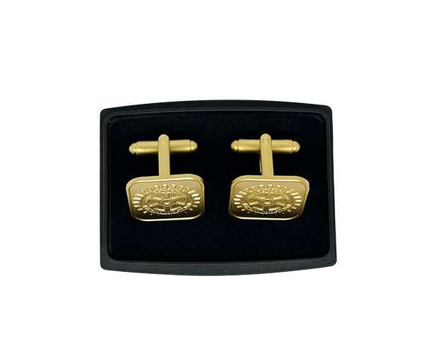 A pair of Rotary Gold Cufflinks is presented in a sleek black rectangular case, set against a white background.