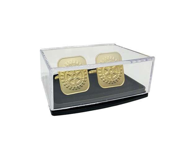 Rotary Gold Cufflinks (Pair) featuring an etched geometric pattern, presented in a transparent plastic display box with a black base.