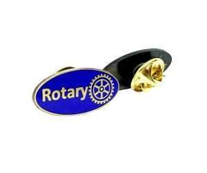 A Rotary Oval Badges - Clutch Pin featuring a blue oval design with the word “Rotary” and a gear symbol, accented by a gold outline and secured with a clasp backing.
