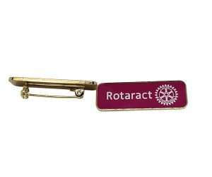 Rotary Rotaract Lapel Badges feature a gold pin with a rectangular maroon badge displaying the word “Rotaract” and a gearwheel logo on the right-hand side.