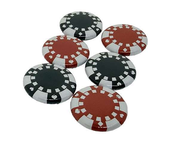 Six poker chips—three black and three red—are scattered across a white background, representing 25mm Personalised Games Counters ideal for tabletop games or customised gaming experiences.